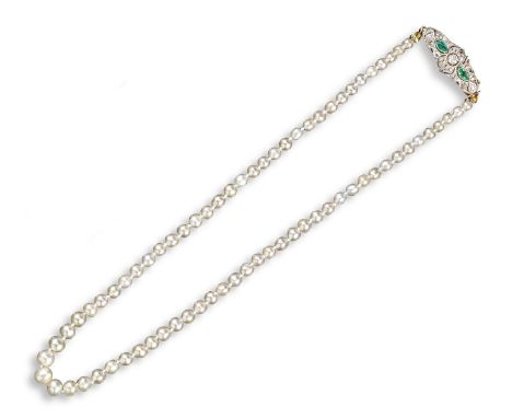 A single row natural pearl necklace, the pearls graduate from ... to ... with an emerald and diamond pierced lozenge clasp se