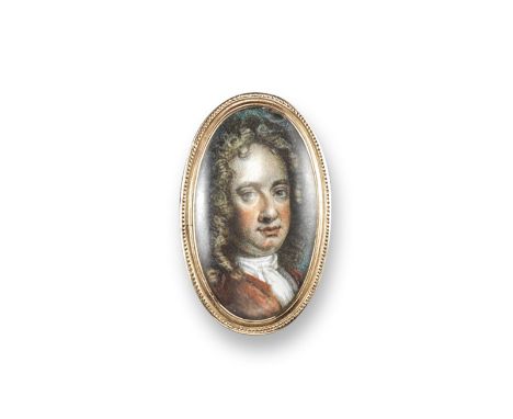 An 18th century oval~shaped glazed miniature portrait ring, the glazed painting believed to be the Baroque composer George Fr