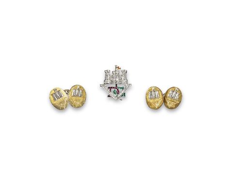 A Regimental brooch for the V Royal Inniskilling Dragoon Guards, set overall with diamonds, rubies and emeralds and with red 