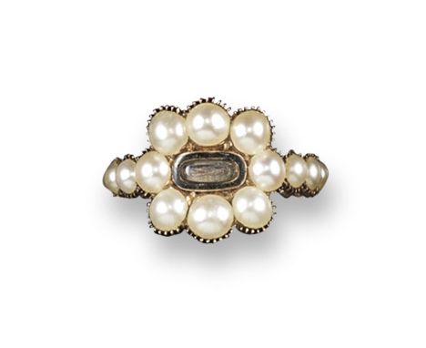 A Regency pearl~set gold memorial ring, centred with a glazed locket within a black enamel border and containing hair. The re