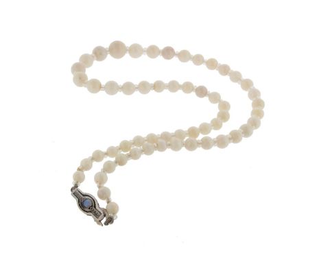 An opal bead necklace, the graduated beads are each separated with a faceted crystal rondel, with an opal~set white gold clas