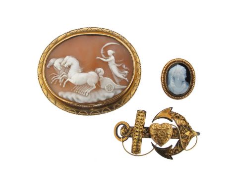 A Victorian pique work faith, hope and charity brooch, a carved hardstone cameo mounted gold ring, and a carved shell cameo m