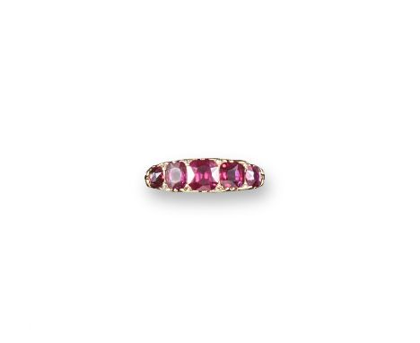 A late 19th century ruby five stone ring, the five oval-shaped rubies are set with eight rose-cut diamonds in yellow gold wit