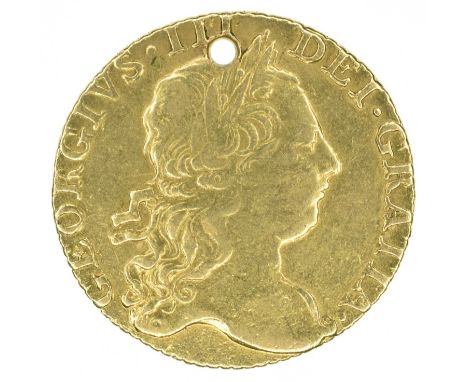 King George III, Guinea, 1772, pierced. King George III, Guinea, 1772, Third laureate head r. R. Crowned shield of arms, edge