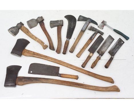 A collection of mainly mid 20th century axes and tools to include military issued examples 