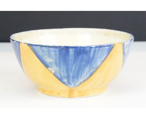 Clarice Cliff Newport Pottery original Bizarre bowl having a yellow ground hand painted with blue triangles. Painted Bizarre 