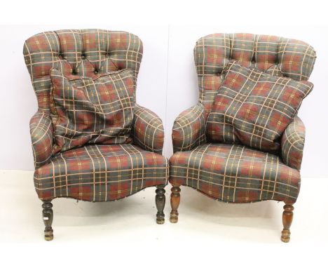 Pair of early 20th century button back armchairs, on turned legs, (one with darker stain), 83cm high x 63.5cm wide x 47cm dee