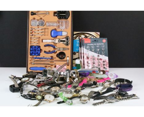 A collection of mainly contemporary ladies and gents wristwatches, watch parts and tools.