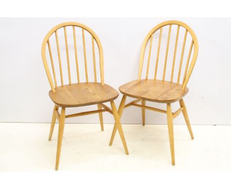 Pair of Ercol chairs, model 370, one with partial label, 82cm high x 42cm wide x 40.5cm deep