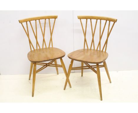 Pair of Ercol blonde model 376 dining chairs, lacking labels, 79cm high x 41cm wide x 41cm deep