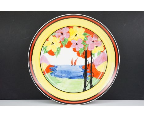 In the manner of Clarice Cliff, a Bizarre Craft ceramic charger hand painted in the Applique ' Palermo ' pattern by Margory H