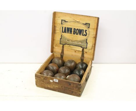 John Jacques &amp; Son Ltd, London Lawn Bowls box with nine various lignum vitae bowls and Taylor-Rolph, London ceramic ball