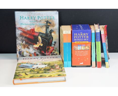 Harry Potter books - large hardback editions of J.K Rowling ‘ Harry Potter and the Philosopher’s Stone ‘ and ‘ Harry Potter a