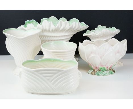 Assortment of five Sylvac shell vases along with Sylvac magnolia flower vase. 