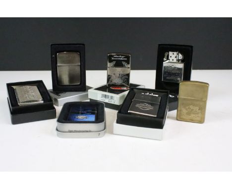 A collection of Zippo petrol pocket lighters to include Harley Davidson examples, mostly within original display boxes.