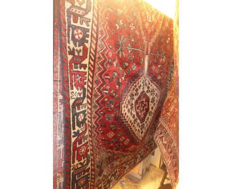 A fine South West Persian Lori carpet 300cm x 160cm, triple pole medallion on a terracotta field within stylised geometrical 