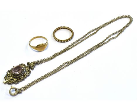 TWO 9CT GOLD RINGS one signet ring and one full set eternity with colourless stones.  Weight 4.0 grams. Also a base metal pen