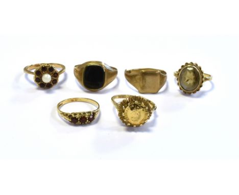 A COLLECTION OF GEM SET RINGS six dress rings, variously set with garnets, smoky quartz, onyx and a white pearl.  Total weigh