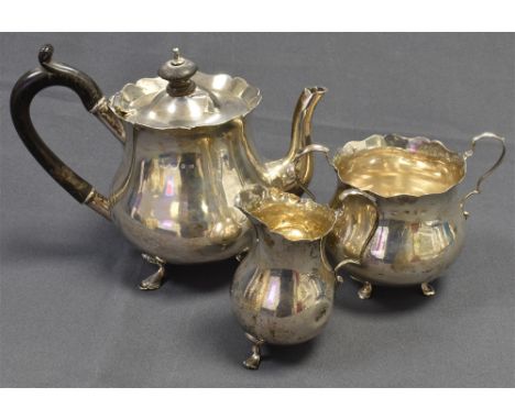 VICTORIAN BACHELORS SILVER TEA SERVICE of baluster form with cartouche shaped decoration to edge on pad feet. Hallmarked Birm