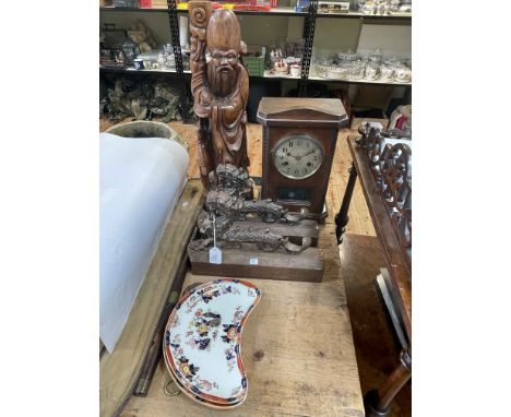 Pair of cast metal Oriental dragon fender ends, carved elder, mahogany mantel clock, flute, etc.