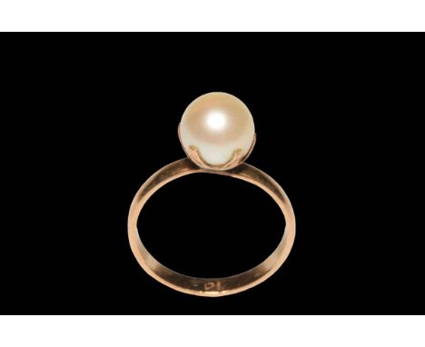 14 carat? gold claw set pearl ring, size O.