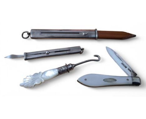 An Edwardian silver and mother pearl fruit knife, brass linings, mother of pearl scales, John Yeomans Cowlishaw, Sheffield, 1