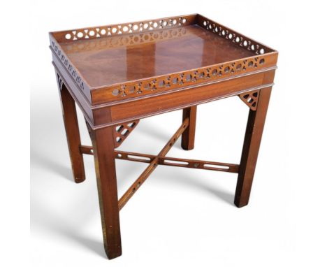 A Chippendale Revival mahogany snd walnut occasional table, pierced fretwork gallery