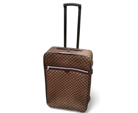Louis Vuitton style - a tanned leather monogrammed Pégase trolley suitcase, 68cm high, 43cm wide, 25cm deep
