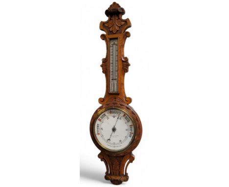A Victorian carved oak aneroid banjo barometer,&nbsp; Boby &amp; Jannings, Ipswich, 86cm high
