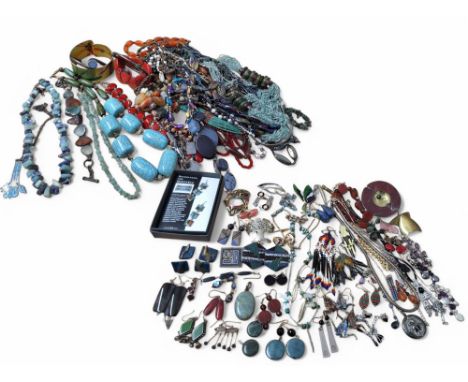 Costume jewellery - a silver bangle set with three oval malachite stones; a silver bangle set with an oval opal?; a silver ba