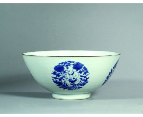 A RARE CARVED BLUE AND WHITE ‘BABY ’ BOWL, SHUNZHI/EARLY KANGXI Size: 23 cm (D) Of rounded form with brown dressed rim, the e