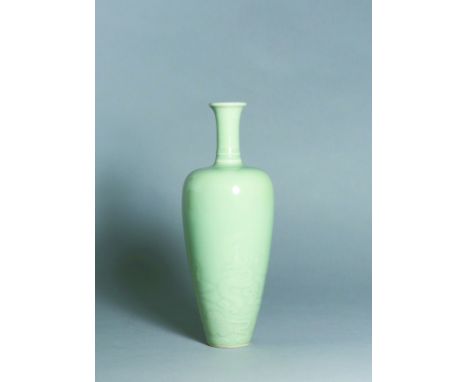 A CELADON-GLAZED ?WILLOW LEAF? VASE, MARK AND PERIOD OF KANGXI Size: 21.5 cm (H)A tapering body with slanting shoulders risin