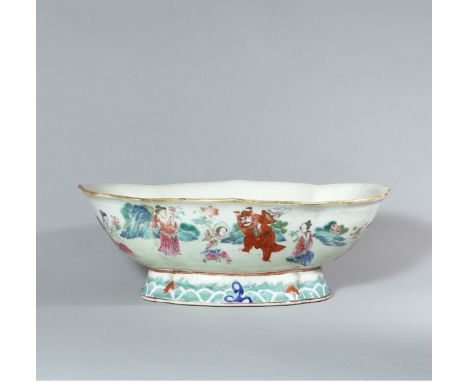 A FAMILLE-ROSE ‘FIGURAL’ JARDINIERE?PERIOD OF JIAQING, QING DYNASTY Size: 27.6 cm (L), 18.7 cm (W), 8.6 cm (H) Of quadrilobed