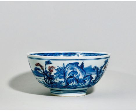 A BLUE AND WHITE ‘SCENERY’ BOWL, PERIOD OF KANGXI Size: 19.6 cm (D), 9.4 cm (H) The rounded sides rising from a tapered foot 