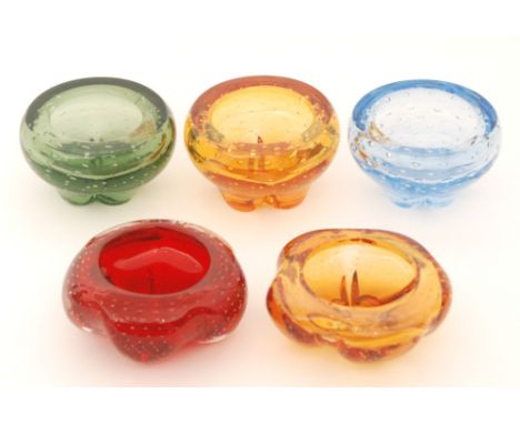 A group of later 20th Century glass bowls with internal controlled air bubble decoration, three of flared form on raised lobe