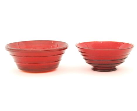 A 20th Century Whitefriars footed fruit bowl designed by Barnaby Powell, pattern 9313, in ruby with ruby ribbon trail, diamet
