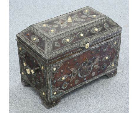 A LARGE WOODEN TIBETAN CHEST, leather clad with applied filigree and metal decoration, inlaid with bone and coloured glass, w