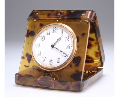 AN EARLY 20TH CENTURY TORTOISESHELL 8-DAYS TRAVELLING CLOCK, the easel case opening to reveal a white dial. 10cm square (clos