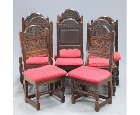 A COLLECTION OF OAK PANEL BACK CHAIRS, LATE 17TH CENTURY AND LATER, including four with dished seats, each raised on block an
