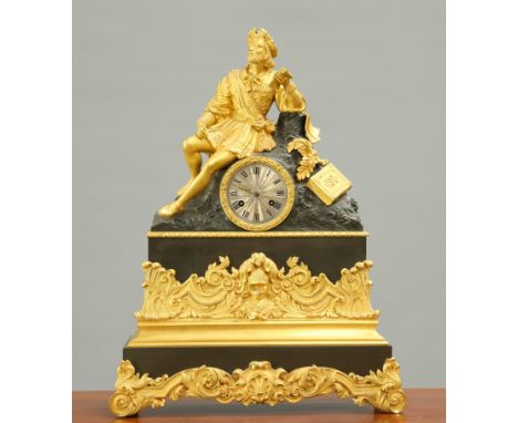 A FRENCH GILT AND PATINATED METAL MANTEL CLOCK, 19TH CENTURY, surmounted by the figure of a scholar reclining on a tree stump