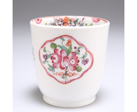 AN 18TH CENTURY ENGLISH COFFEE CUP, painted with floral reserves and sprays and a floral garland border to the interior. 7cm 