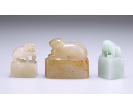 A GROUP OF THREE SMALL CHINESE JADE ZOOMORPHIC SEALS. Largest 3.5cm wide