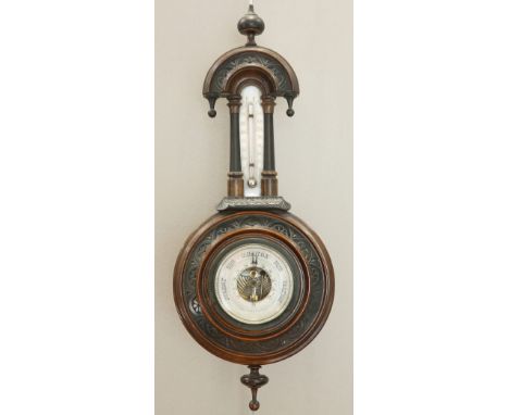 A LATE VICTORIAN WALNUT WHEEL BAROMETER, with thermometer. 43.5cm high