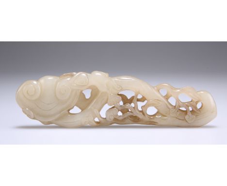 A CHINESE PIERCED JADE CARVING, carved with ruyi-heads and vine. 14cm long