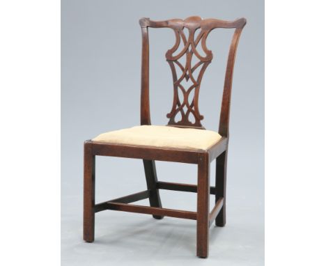 AN 18TH CENTURY MAHOGANY 'CHIPPENDALE' SIDE CHAIR, with pierced splat below a shaped crest rail, raised on square section leg