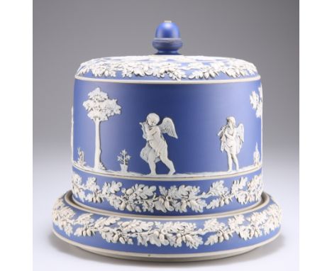 A VICTORIAN BLUE JASPERWARE CHEESE DOME, decorated with putti playing musical instruments and borders of oak leaves, with an 