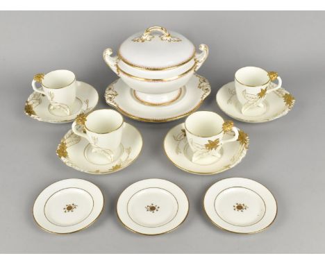 A Set of Four Late 19th Century Brownfield Aesthetic Porcelain Cups and Saucers with Stylised Handles and Feet Decorated in G