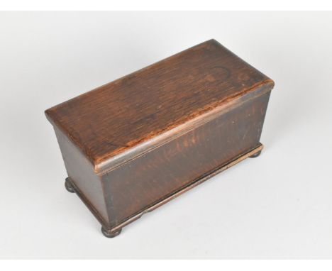A Late 19th Century Oak Two Division Tea Caddy of Sarcophagus Form with Four Bun Feet, 22.5cms Wide