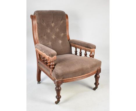 A Late Victorian Mahogany Framed Button Upholstered Armchair