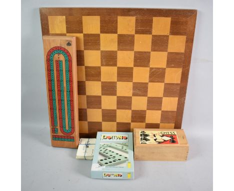 A Modern Wooden 45cms Chessboard together with a Wooden Cribbage Board, Boxwood Chess Set, Dominoes Set and Playing Cards